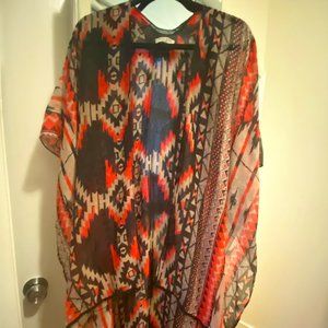 Tassel bottomed poncho style cape
